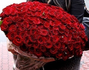 a bouquet of roses for a woman