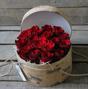red roses in a bucket